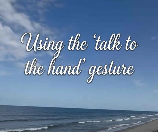 talk to the hand gesture. Photo by Dr. Jeanette Gallagher